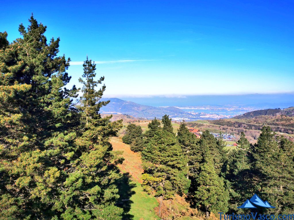 views of the grove and bilbao from the route through the labyrinth of La arboleda, peñas negras